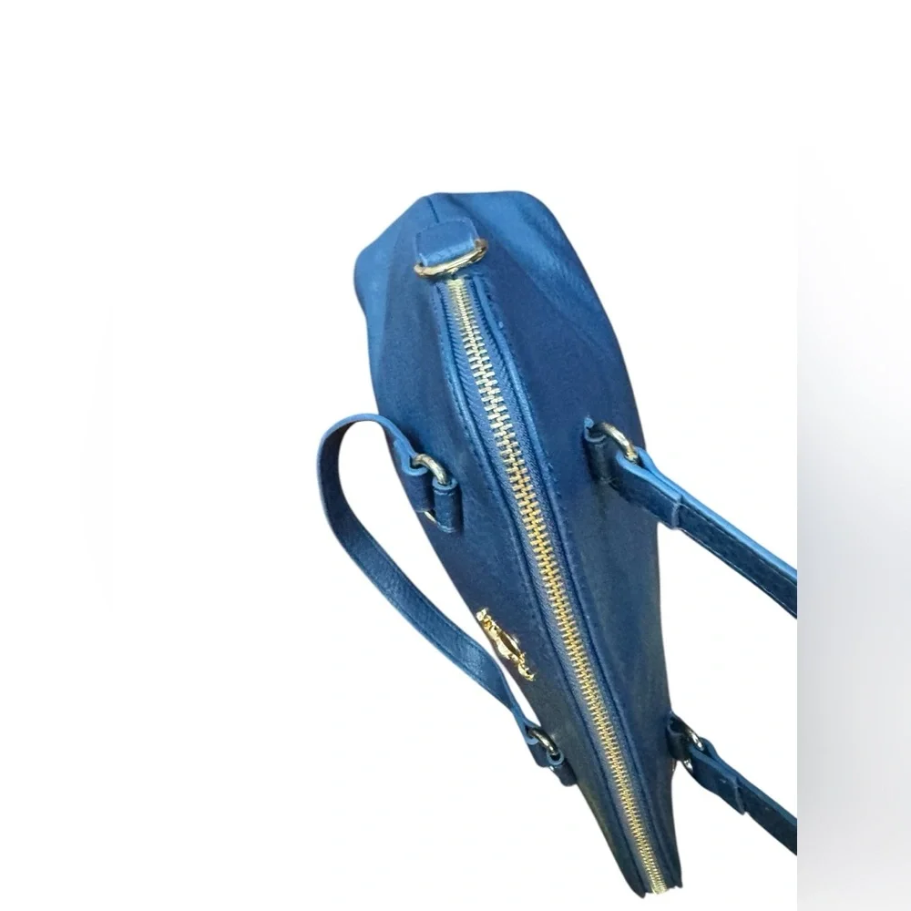 Charming Charlie navy blue vegan leather handbag.